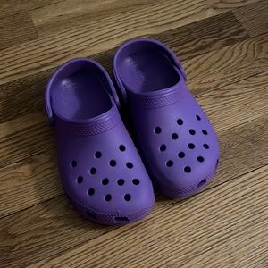 Child purple crocs size 12. Never worn
